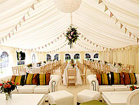 Marquee with sofas, tables and cube seating