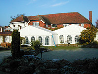 Marquee attached to a house