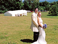 Bride and groom and their marquee