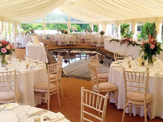 Open sided marquee round a pond