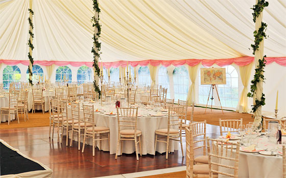 Bright wedding marquee with white and pink colour scheme