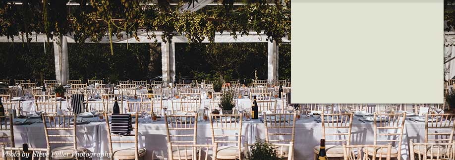Trestle tables and gilt chairs