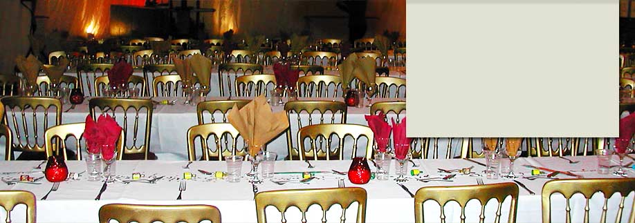 Trestle tables and gilt chairs