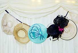 Hats strung up along a marquee wall