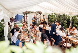 Pretty wedding reception in a small marquee