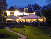 Frame marquee attached to a house