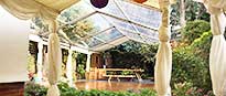 Marquee interior with lanterns and clear roof