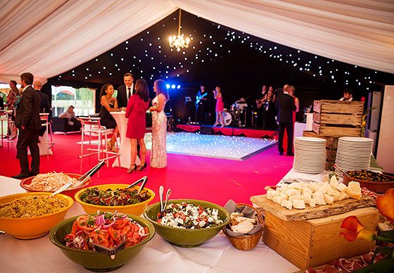 Party marquee with candles and night sky