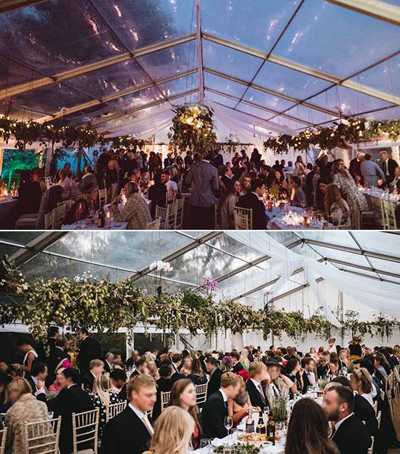 Clear marquee with hanging greenery