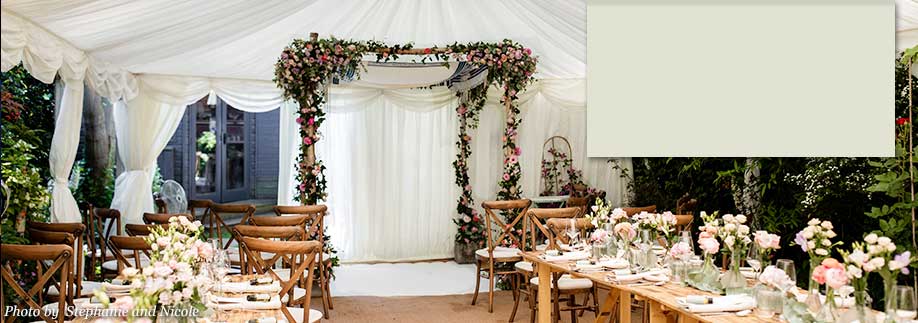 Wedding ceremony marquee with chuppah at Hampstead Garden Suburb