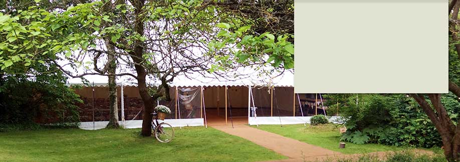 Traditional style tent at wedding venue Westmead Events at dusk